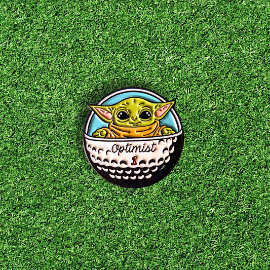 golf ball marker of green star baby in golf ball spaceship