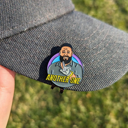 dj khaled golf ball marker clipped on hat