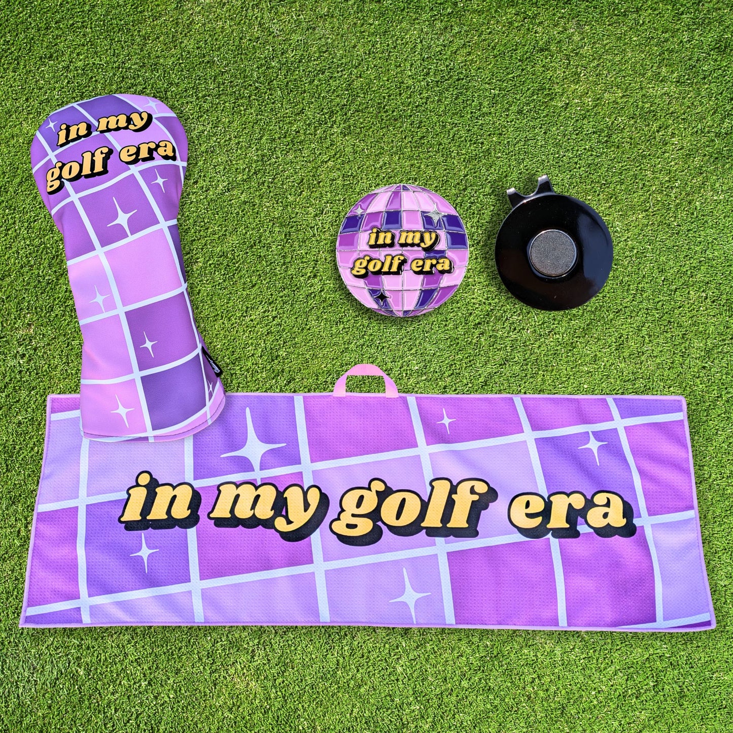 purple swiftie golf gift set that includes headcover, towel, and ballmarker with mirrorball design that says 'in my golf era'