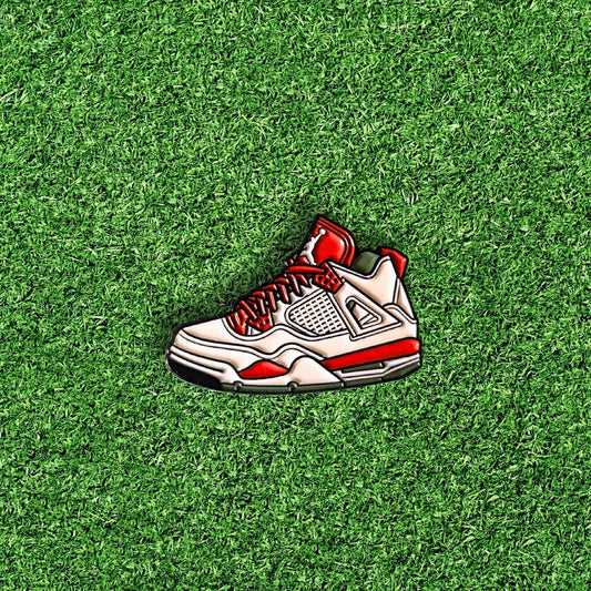 red and white sneaker golf ball marker